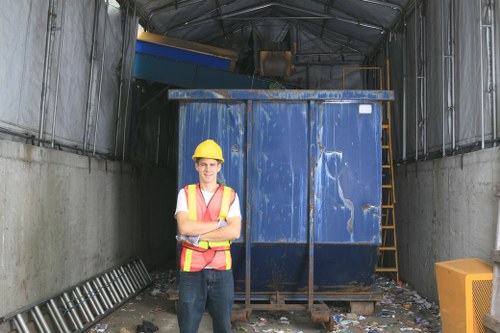 Sorted commercial recycling containers outside a business